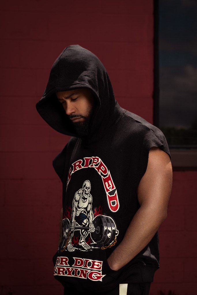 GRODT Cut-Off Hoodie worn with the hood up